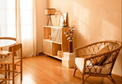 Sunny room with a rattan chair and wooden shelving